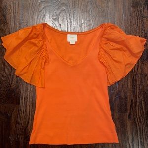 bright orange blouse